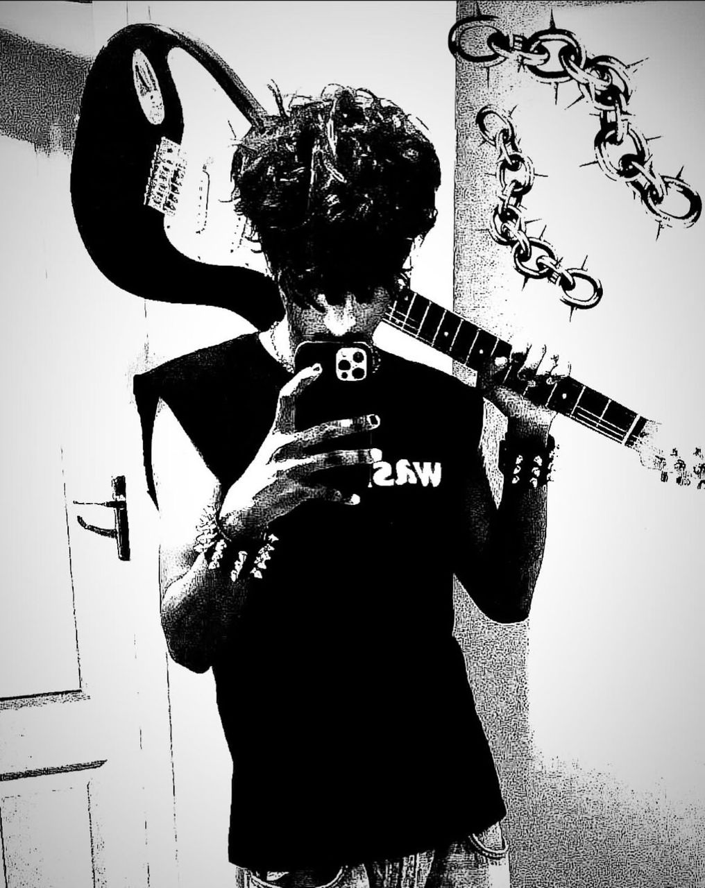 Ash Holding Guitar